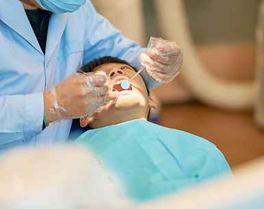 Kid Receiving Dental Treatment