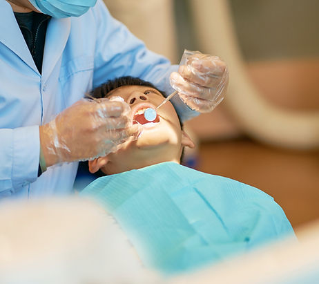 Kid Receiving Dental Treatment