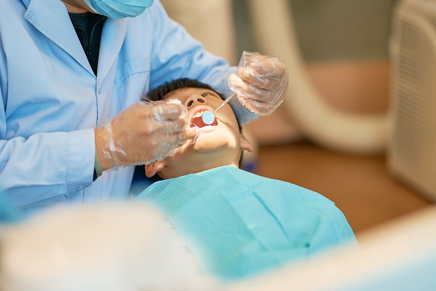 Kid Receiving Dental Treatment
