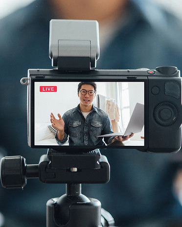 Vlogger looking at camera