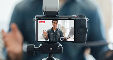 Vlogger looking at camera