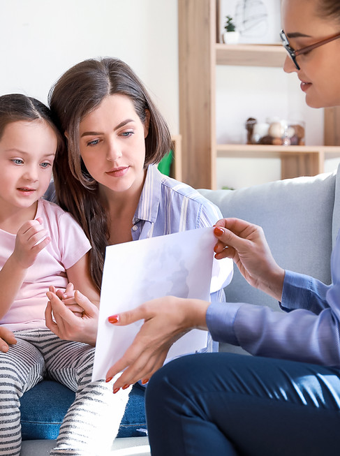 Therapist working with a child client—to represent behavioral health billing