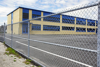 Metal security fence at a commercial building