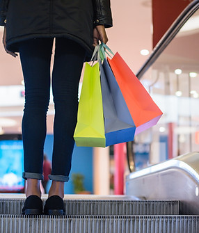 Shopping On Escalator