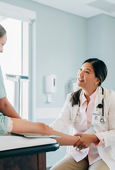 Doctor With Patient