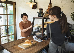 Store Clerk and Customer with Smile