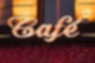 Neon sign on cafe shop front