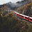 Train driving through nature