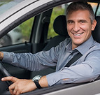 Businessman Driving a Car