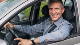 A confident driver behind the wheel