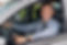 Businessman Driving a Car