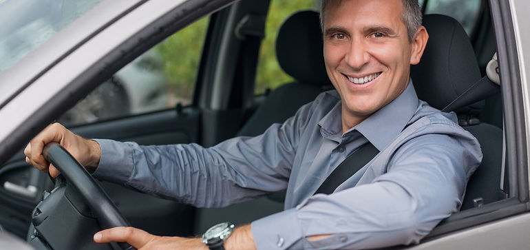 Businessman Driving a Car