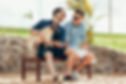 Two Men with a Dog