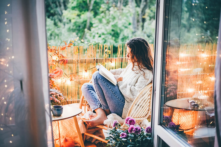 Reading a Book in Balcony