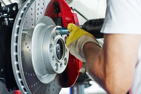 Hands Screwing Up Bolts