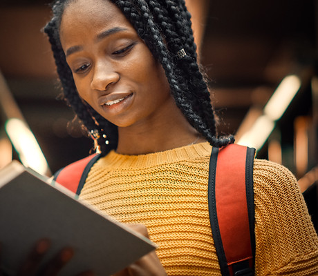 A Young Woman Reading a Book