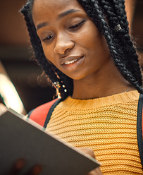 A Young Woman Reading a Book