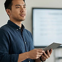 Man Holding Tablet