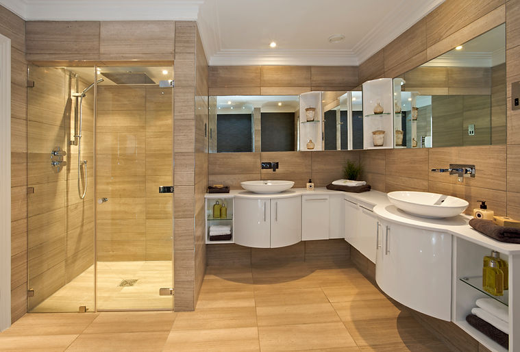 a beautiful bathroom suite in a luxury new home with a large shower unit to the left