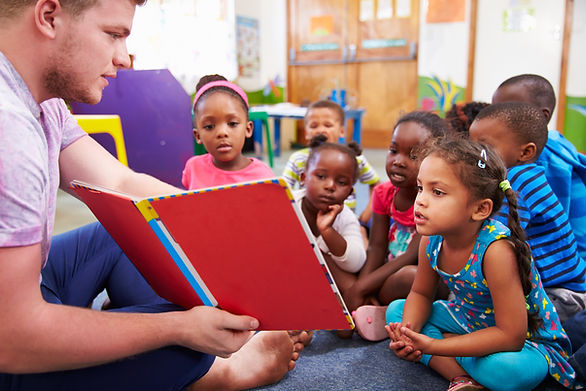 Teacher Reading to Kids