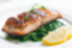 Grilled salmon on spinach