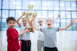 Kids Holding Trophy