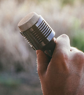 Hand Holding Microphone