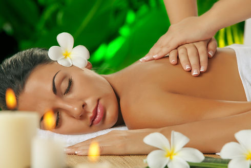 Portrait of young beautiful woman in spa environment