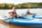 Children Kayaking Outdoors at the lake