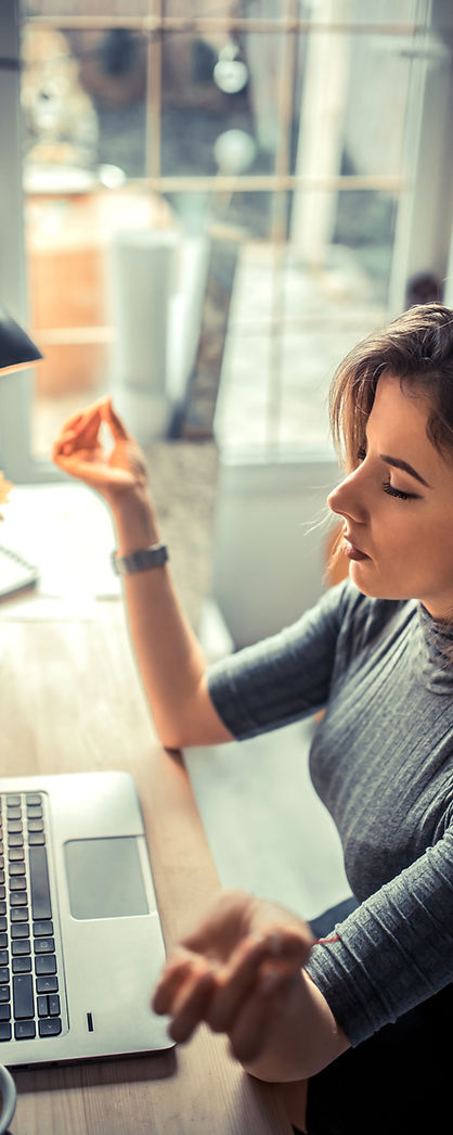 Woman Meditating at Desk