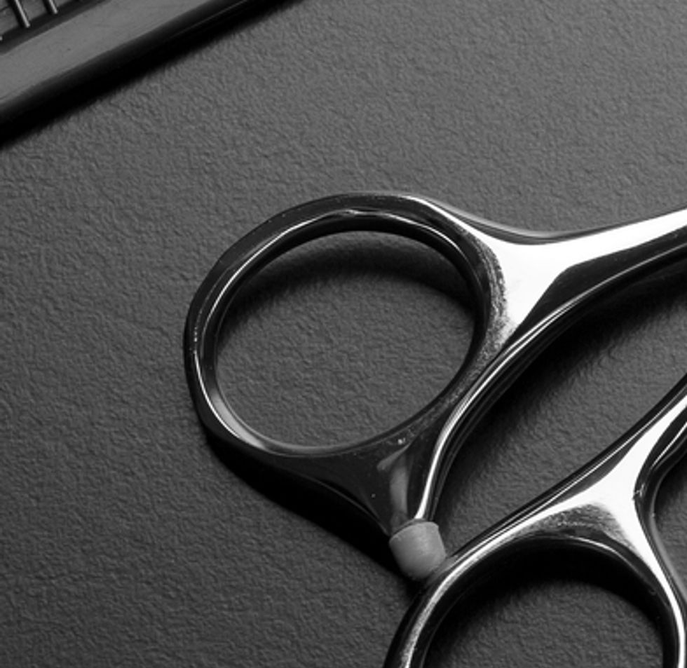 In the image, you see scissors, and a comb