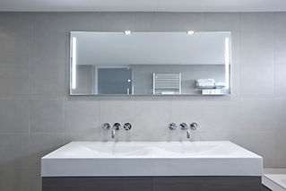 Sink and mirror in modern bathroom