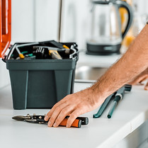 Property Management electrician working with tools