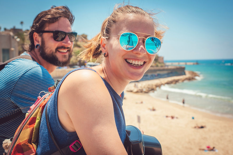 Smiling friends on the seashore