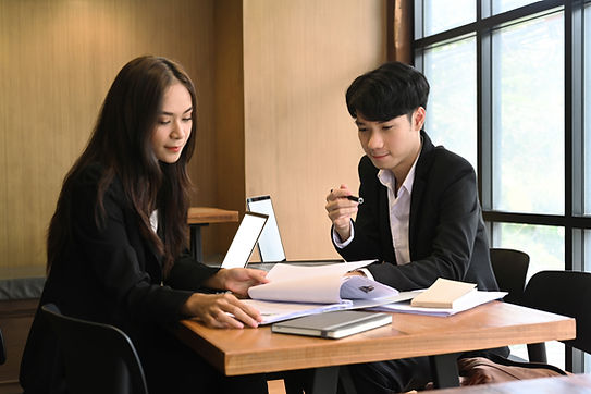 A man and a woman discuss about work