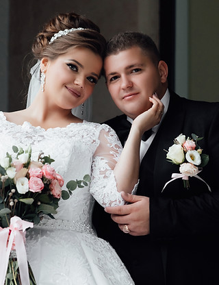 Bride and groom smiling