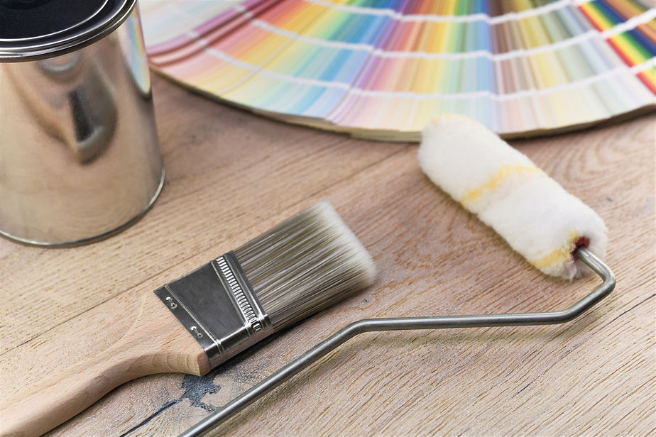 Paint bucket with paint brush, roller, palette color and paint can