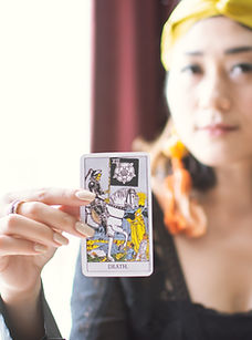 Holding Tarot Card