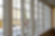 A glazed window with wooden frames