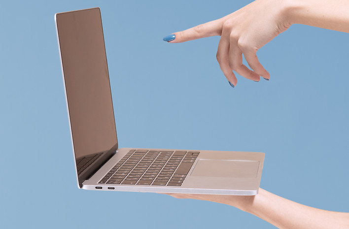 Silver Laptop Interaction