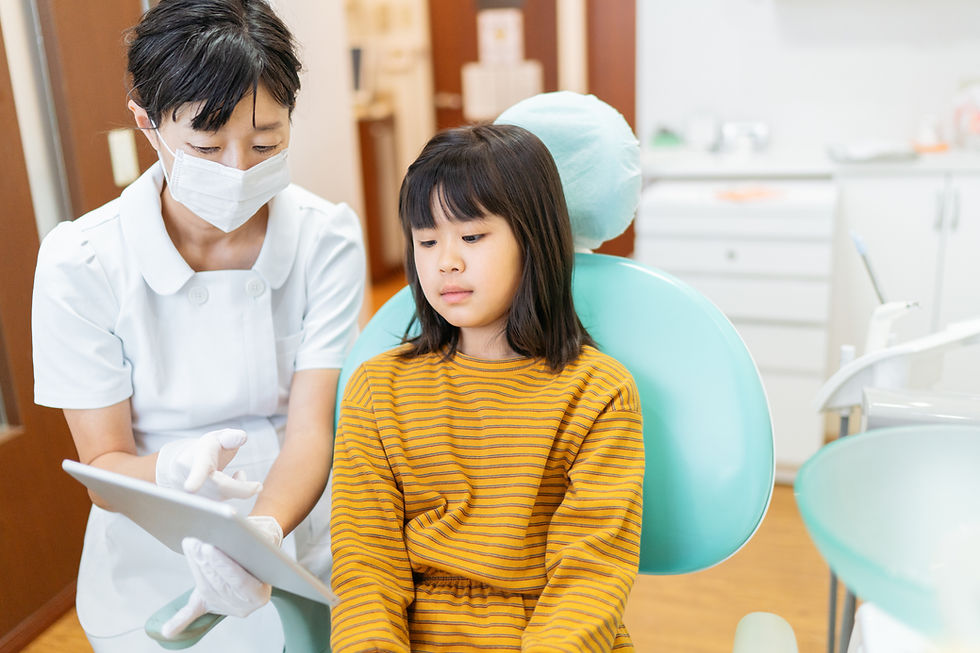 doctors explaining to child sedation for dental procedure