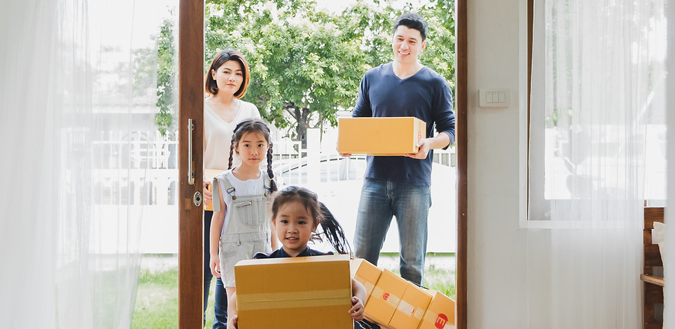 A family moving into a house