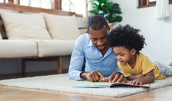 Father and Son Reading a Book
