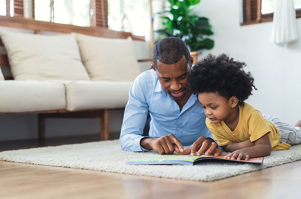 Father and Son Reading a Book