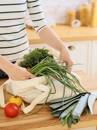 Woman Unloading Grocery