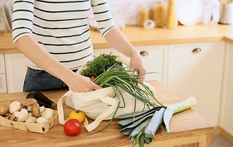 Woman Unloading Grocery