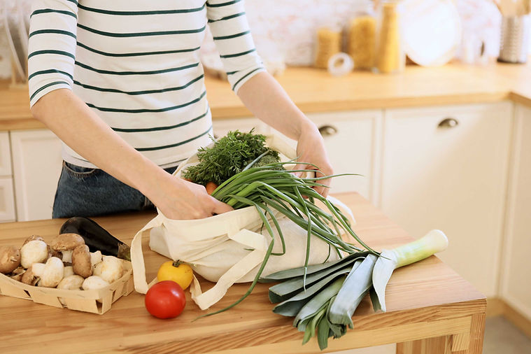 Woman Unloading Grocery