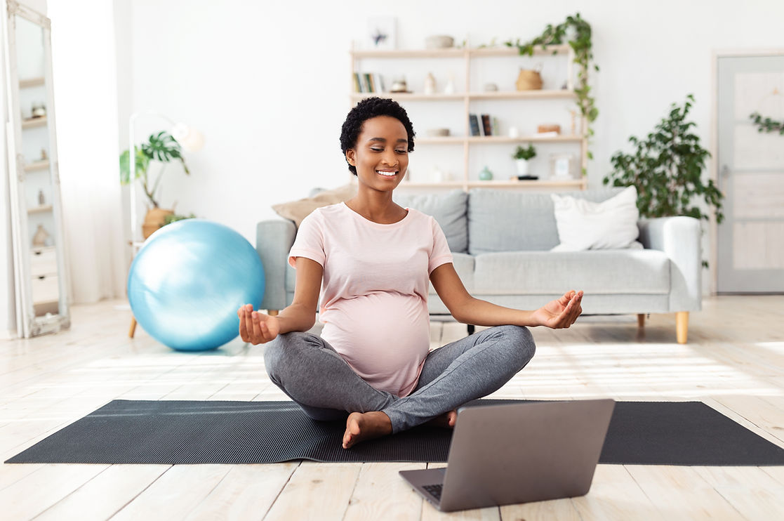 Maternity Yoga with Computer and Mat