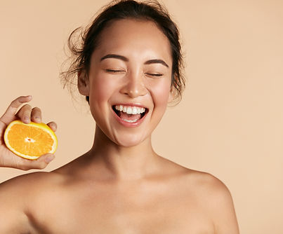 Smiling Woman with Orange