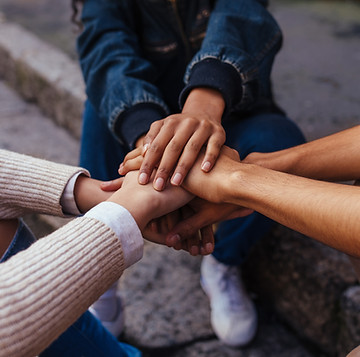Hands Showing Unity